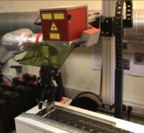 Компания «Прософт-Системы» успешно реализовала пилотный проект по роботизации процесса лазерной маркировки на своем производства